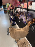SUEDE BOBBY BANANA BAG SAND